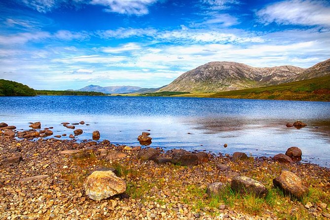 From Dublin: Kylemore Abbey, Connemara, Killary Fjord & Galway - Killary Fjord cruise in summer, sheep farm in winter