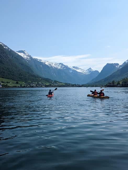Olden: Guided beginner friendly fjord kayaking.Local company - Meeting at the cruise terminal: quick start, no transfer hassle