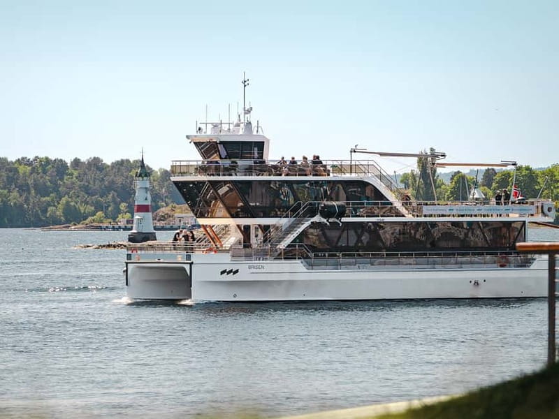 Oslo: Guided Sightseeing Fjord Cruise on Premium Silent Boat - Onboard comfort: decks, warm rooms, cafe snacks, and quiet joy